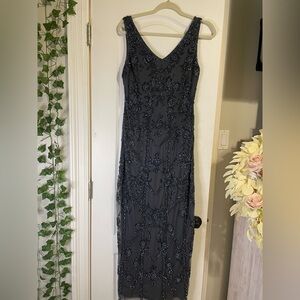 Beautiful gray beaded gown, no flaws, slightly weighted due to beading.